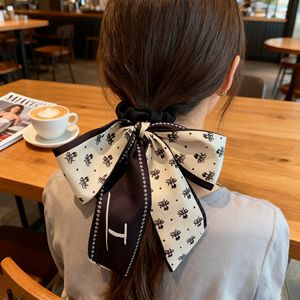 कोरियन शैली सुरुचिपूर्ण गुलाबी पुष्प प्रिंट रेशम के साथ धनुष गलीदार बाल सहायक 14 सेमी पार्टी - Product Image 2