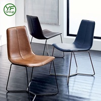 Chaise de restaurant en cuir de qualité supérieure avec base croisée en métal robuste, mobilier d'hôtellerie pour projets commerciaux aux États-Unis