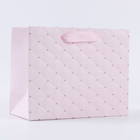 Sacs en carton ivoire de luxe personnalisés avec logo imprimé, recyclables, avec poignées en ruban, impression UV, pour promotion de boutiques de détail