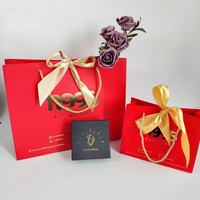 Luxe papieren cadeauzakjes op maat - Gouden foliedruk grote strik cadeauzakjes met touwhandvatten voor Valentijnsdag, bruiloft, feestjes