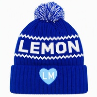 Bonnet à pompon personnalisé avec logo, en tricot épais extensible 100% acrylique, avec patch brodé jacquard en forme de cœur, idéal pour les sorties décontractées et les tenues de campus
