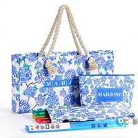 CHIVAN Ensemble de Mahjong manuel 166 tuiles blanches de 1,2 pouces 4 supports colorés avec poussoirs Sac de rangement bleu Kit de jeu pour la maison et les fêtes