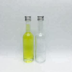 ผลิตขวดแก้วขนาด 2 ออนซ์ 50 มล. สำหรับบรรจุสุรา ขวดวิสกี้ขนาดเล็กแบบมีฝาเกลียวสำหรับเครื่องดื่มแอลกอฮอล์ - Product Image 1