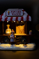 Décoration de Noël en résine avec scène de village musicale LED, décoration d'intérieur, chariot à popcorn vintage lumineux, ornement artisanal en résine