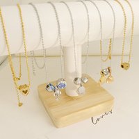 Hochwertiges Gold Edelstahl Tropfenförmiges Schwarzes Zirkon Schmuckset Großhandel Facettierter Schwarzer Zirkon für Lateinamerikanische Marktboutiquen