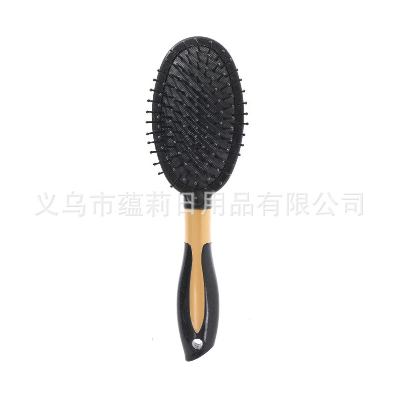 Black oval [with gold central ring cushion comb]