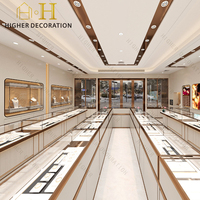 Comptoir d'exposition de bijoux de luxe, vitrine à bijoux en verre sur mesure avec éclairage LED