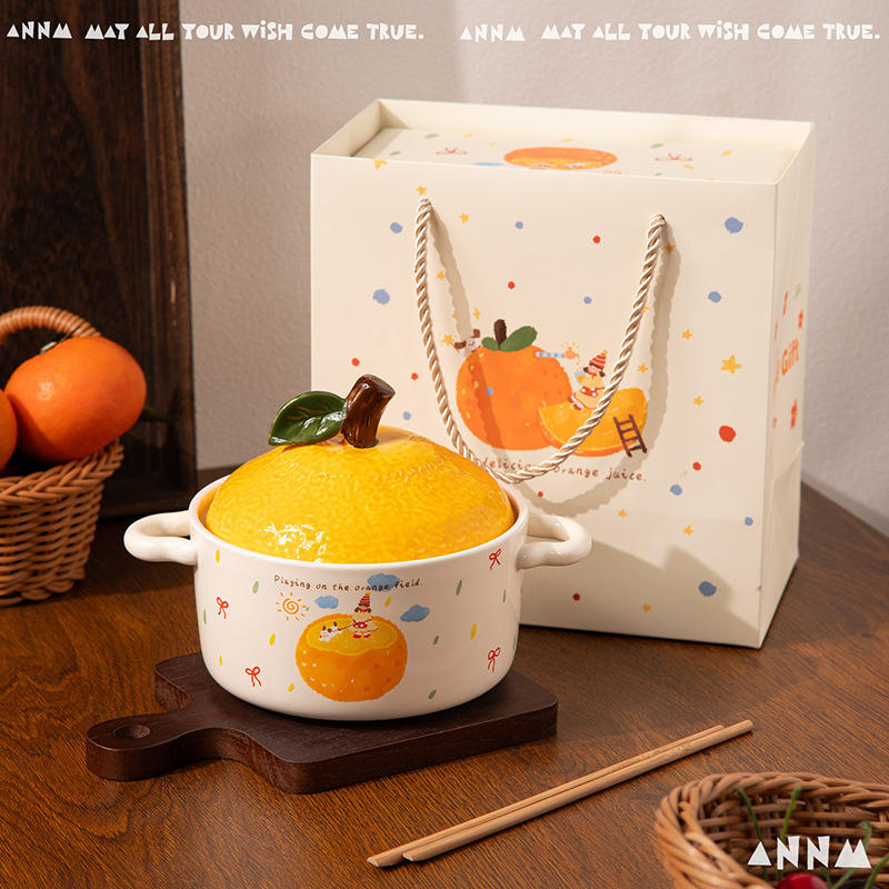 B. Half an orange (in a tote bag)