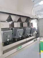 Machine de pesage, de remplissage et de scellage semi-automatique pour l'industrie des collations, des noix, des haricots, des céréales et des granulés de graines