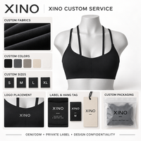 Soutien-gorge de yoga halter éco-responsable en tissu recyclé, séchage rapide, maintien élevé, avec logo frontal et design élégant au dos, idéal pour la course et le fitness