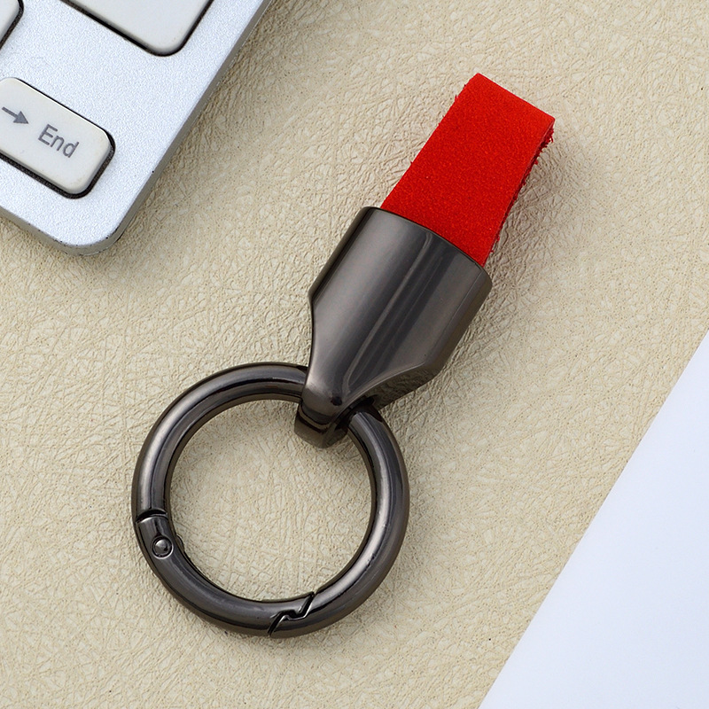 Bague noire rouge + pistolet