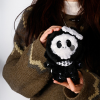 Fabricant de jouets en peluche personnalisés : Crâne gothique noir et blanc avec détails squelettiques pour cadeaux de style sombre