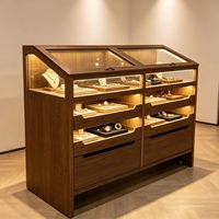 Vitrine à bijoux éco-responsable éclairée par LED, dimensions personnalisables, construction durable, finition de haute qualité pour les magasins de détail