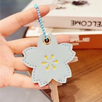 Étui de protection pour clés en cuir PU élégant, en forme de fleur, écologique, de haute qualité, couleur personnalisée, sac de rangement portable, porte-clés