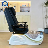 Fauteuil de pédicure de luxe avec bassin en verre, dossier inclinable électrique et massage pour salon de beauté des ongles