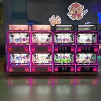 Jeux à pièces pour quatre joueurs Arcade Mini peluche Poupée Grue à griffes Machine avec vitrine
