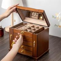Boîte de rangement à bijoux en bois grande capacité avec serrure, miroir et crochets latéraux pour bagues, boucles d'oreilles et bracelets