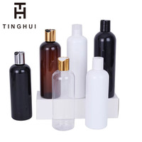 50ml 100ml 150ml 200ml 250ml 500ml Bouteille de lotion en plastique avec bouchon à disque doré Huiles essentielles Emballage cosmétique Bouteille de shampooing
