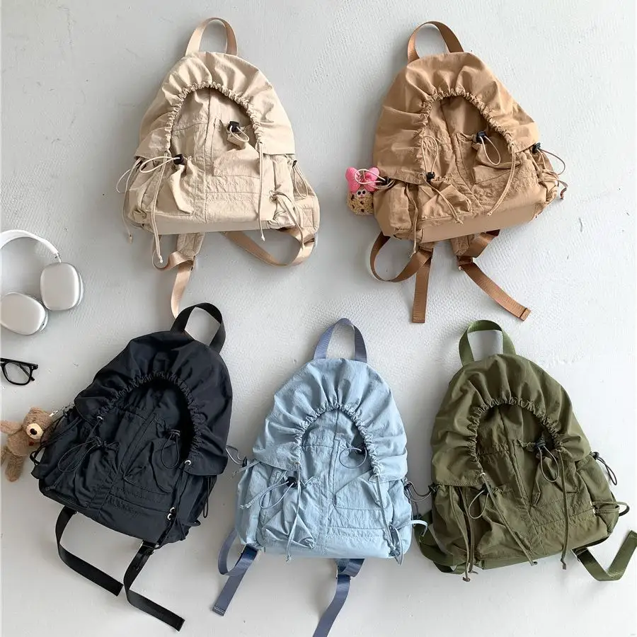 2023 nueva mochila de ocio de nailon de gran capacidad, bolso de hombro de diseño plegable con cordón pequeño para mujer