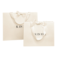 Sacs en papier d'art estampés à chaud or/argent de qualité supérieure, style classique avec lamination et impression numérique