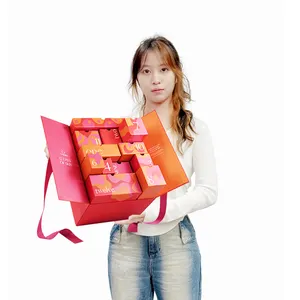 Kotak kalender kedatangan kustom natal merah muda grosir 24 hari dengan pita untuk perawatan kulit kosmetik