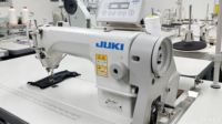 Machine à coudre industrielle à point noué à aiguille simple DDL-8700-7 d'occasion
