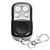 Télécommande métallique 433 MHz à quatre boutons pour portes de garage et portails roulants