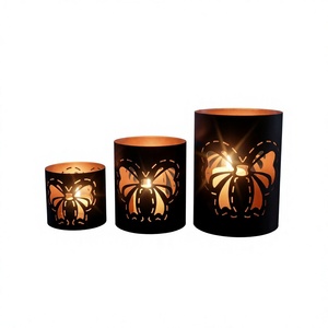 Bougeoir en métal noir avec design en forme de nœud pour décoration d'Halloween - Product Image 1