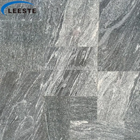 Tuiles et dalles en granit blanc et noir Nero Santiago populaires