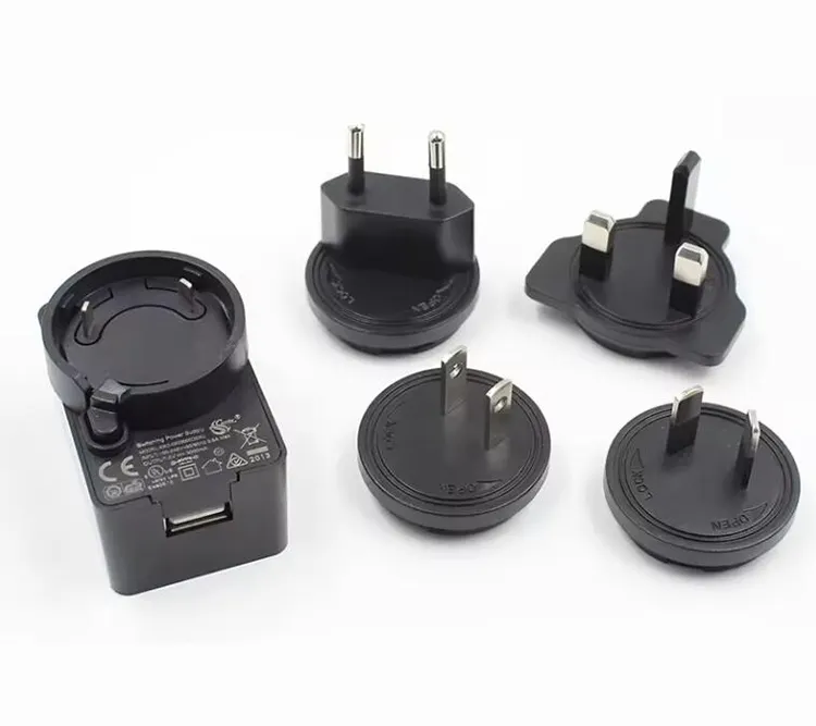 Adaptor dapat dipertukarkan 12 V 1A catu daya USB konektor jack 12 Volt 1 Amp AC DC Adaptor pengisi daya dengan US EU UK AU plug