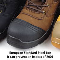 Bottes de sécurité hivernales à embout d'acier en cuir véritable mi-montantes avec semelle extérieure en PU/caoutchouc anti-perforation pour la construction et l'usine