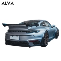 Kit carrosserie aérodynamique en fibre de carbone sèche AMANS Design Ghost Aero, pare-chocs arrière avec finition polie pour Porsche 911 992 GT3RS côté gauche