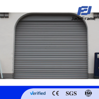 Porte de garage enroulable manuelle en acier insonorisée et antivol moderne pour entrepôt commercial 10 x 10