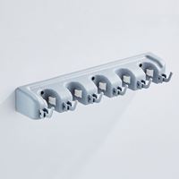 Support mural moderne en plastique noir pour balais, balais à poussière et manches de serpillères, organisateur d'outils pour salle de bain d'hôtel