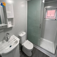 Maison conteneur extensible à double aile utilisée pour le transport de fournitures de secours et transformée en abris temporaires