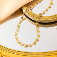 Parure de bijoux fantaisie de luxe étanche en acier inoxydable plaqué or 18 carats avec collier et bracelet en forme de cœur pour femme, vente en gros