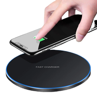 Chargeur sans fil rond en métal noir certifié 15W, avec lumière LED magnétique et charge rapide, idéal pour les cadeaux promotionnels