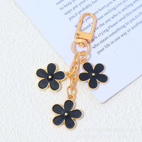 Porte-clés et pendentif de sac double face en alliage de zinc, motif fleur goutte d'huile, mignon et tendance, avec logo personnalisé, étanche et léger