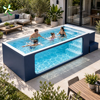 Piscine en fibre de verre de style conteneur moderne avec panneau de visualisation clair et marches latérales pour les jardins de complexes hôteliers