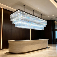 Lustre rectangulaire à plusieurs niveaux en cristal, cadre noir de luxe, luminaire linéaire pour hall d'hôtel, salle de banquet, éclairage intérieur