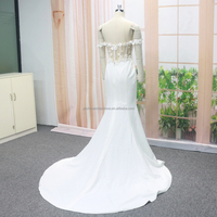 Robe de mariée sirène de luxe moderne en crêpe, longueur ras du sol, avec taille princesse, décoration florale et traîne chapelle
