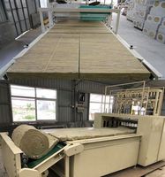 Machine à coudre entièrement automatique pour panneaux rigides et matelas en laine de roche minérale souple et fibre de verre