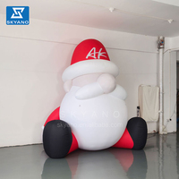 Décoration extérieure gonflable de Noël personnalisé faire sauter énorme grande barbe gonflable assis père noël pour décor de cour