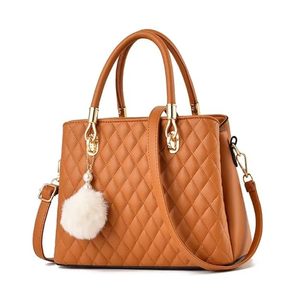Bolso de mano de piel sintética acolchada color canela para mujer, bolso de lujo con dije de pompón y correa de hombro desmontable para fiestas y oficina - Product Image 2