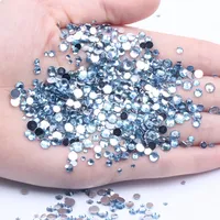 Prix d'usine Strass en verre en vrac, cristal, accessoire de décoration pour vêtements, non thermocollant, à dos plat, phosphorescent pour le nail art