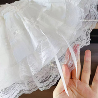 Robe d'été 2026 style ballet, jupe courte bouffante en dentelle à volants et nœud, coupe trapèze féminine et amincissante
