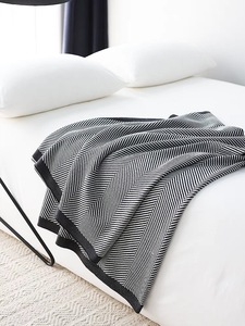 Venta al por mayor nórdico simple viento de punto diseño de onda nueva línea de manta de punto