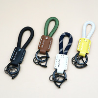 Porte-clés de voiture en cuir véritable fait main, cordon tressé, pendentif personnalisable avec logo, lanière anti-perte