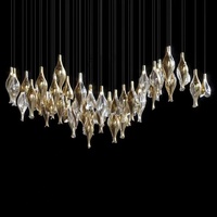 Luminaire suspendu personnalisé Firelux pour escalier d'hôtel de luxe, avec source lumineuse, en verre bleu doré