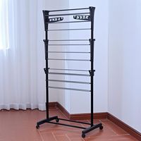 Séchoir à linge pliable et mobile en métal noir pour rangement de vêtements